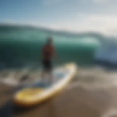 User efficiently packing an inflatable paddle board for travel