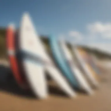 A close-up of surfboards lined up on the sandy beach of Chicama