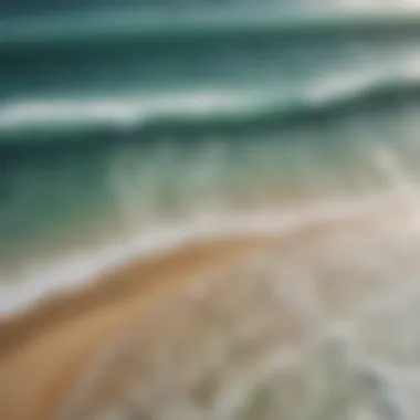 An aerial view of a vibrant beach with surfers enjoying the water