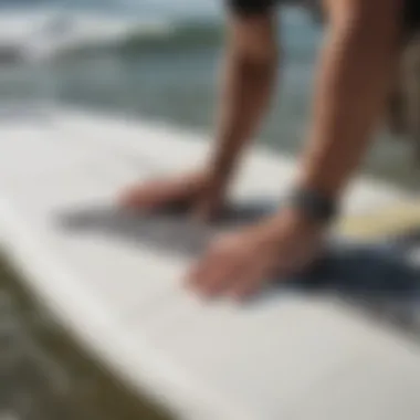 Installation Techniques for Dakine Contour Footstraps Installing Dakine Contour footstraps on a surfboard, highlighting installation techniques.