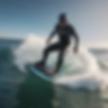 A dynamic view of a rider using an electric jet-powered body board in the ocean.