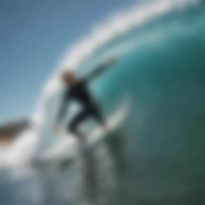 A surfer catching a wave, demonstrating the dynamic relationship between surfboarding and saltwater