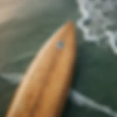 Close-up of a vintage surfboard showing wear and patina