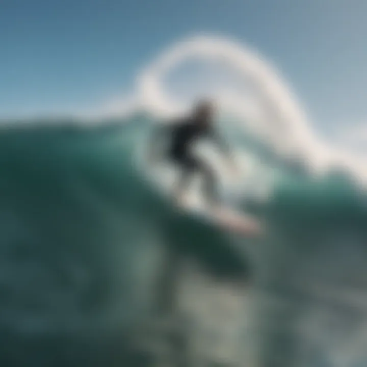 An action shot of a surfer riding a shortboard on a wave