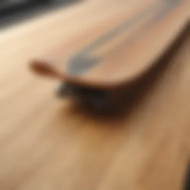 Close-up view of a longboard deck highlighting its unique construction materials