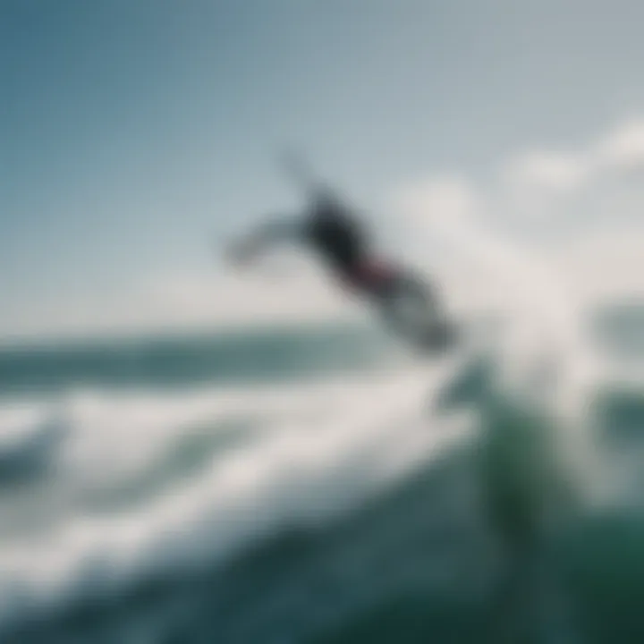 Dynamic aerial view of a foil kitesurfer gliding above the water