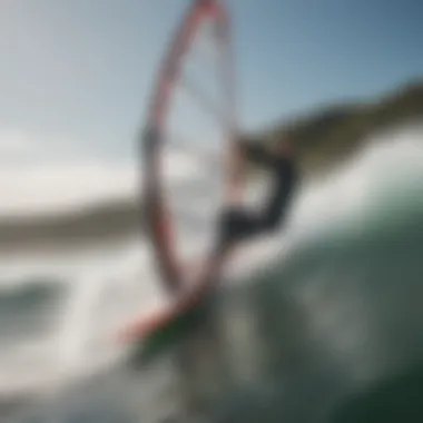 A scenic photo of a windsurfer navigating the waves, demonstrating technique