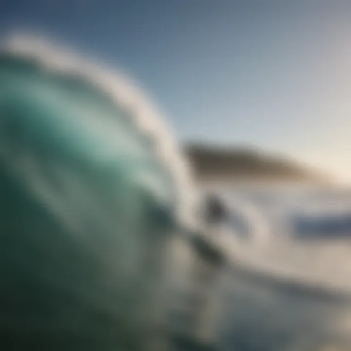 An ocean view with surfers in action during high tide