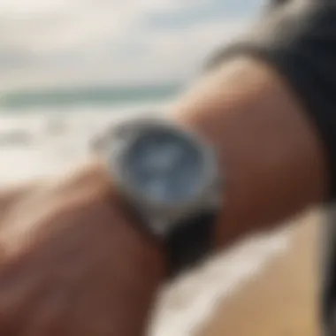 A tide indicator watch worn by a surfer on the beach