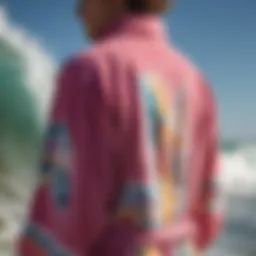 A close-up view of a vibrant towelling robe hanging on a surfboard