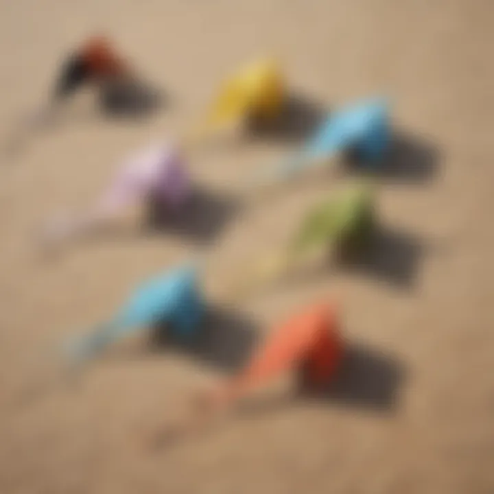 Close-up of different kite types laid out on the ground