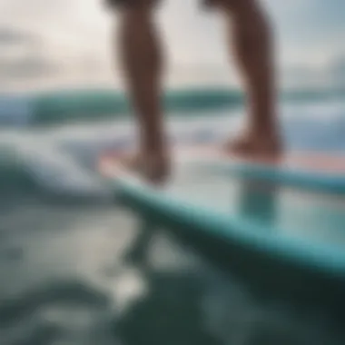 A close-up of a surfer's feet on a surfboard above the water