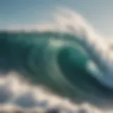 A close-up view of a breaking wave showcasing its powerful crest and foamy texture